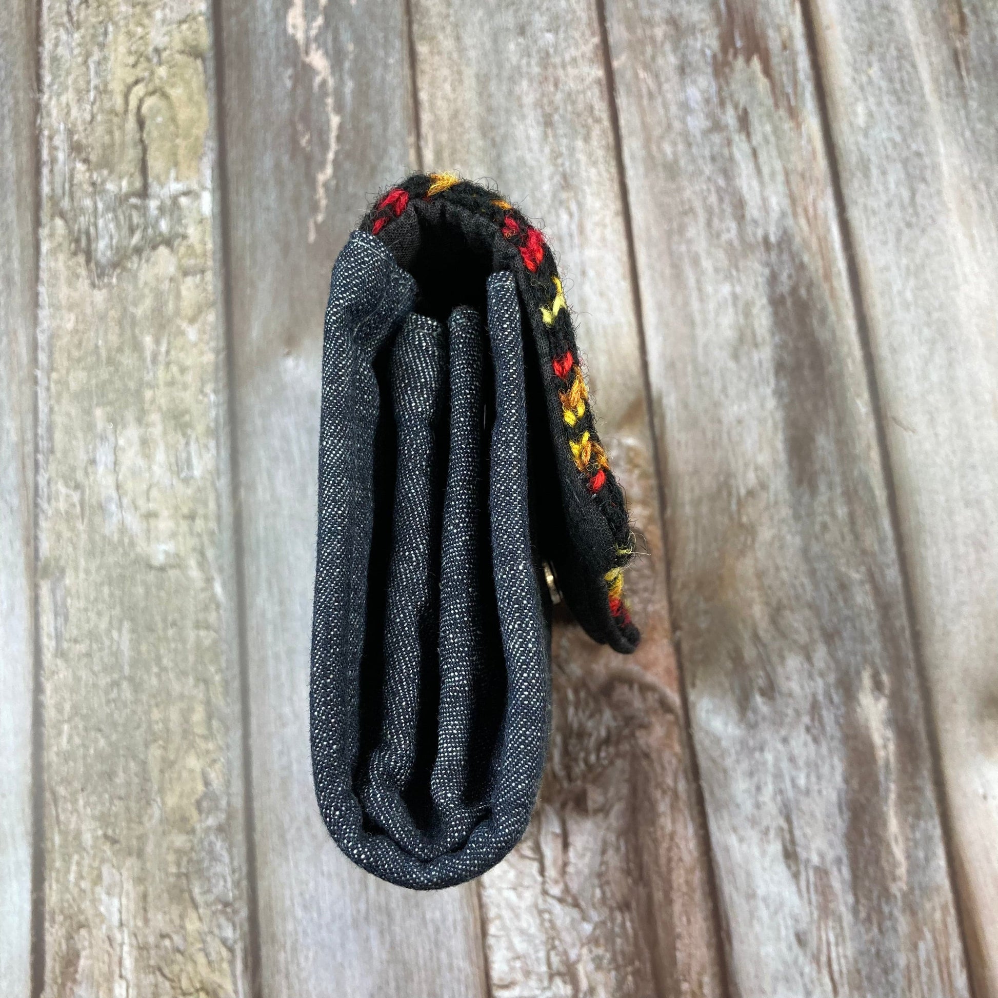 Hand knitted Fair Isle Purse Clutch | Black Red Yellow Star